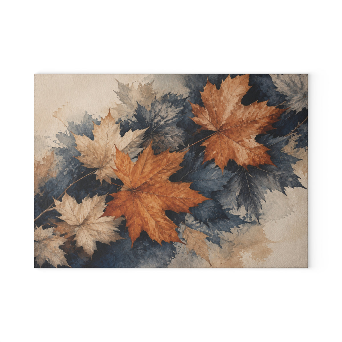 A rectangular cutting board featuring a watercolor-style arrangement of autumn in Vermont maple leaves in orange, tan, cream, and dark blue-gray tones on a light beige background.